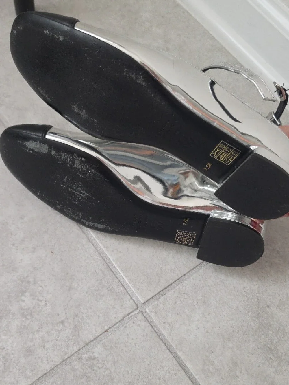 Stuart Weitzman Silver and Black Cap-Toe Ankle-Strap Flats